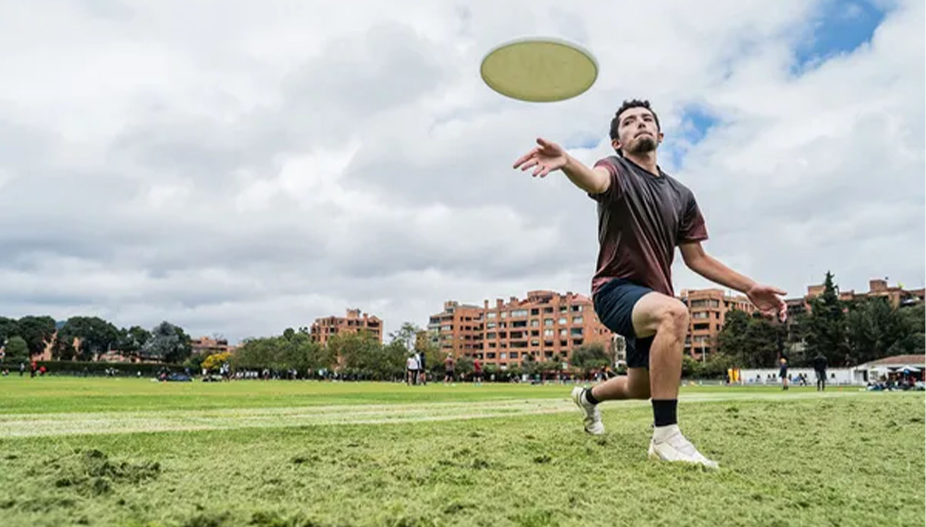 male throwing frisbee